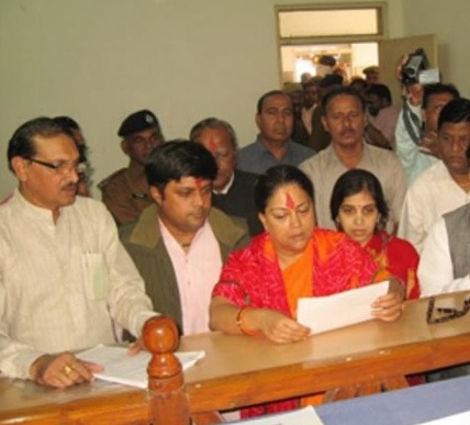 Dushyant Singh with her wife, Niharika Raje, and mother Vasundhara Raje