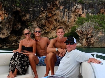 Christian Huff with his dad Chandler Huff, mom Cheri Huff, and brother Chance Huff
