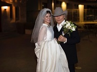 Emily Joyce and her partner Dwight Yoakam
