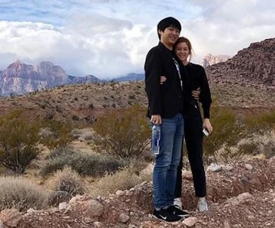 Cari Cakes posing along with her husband Sympha Kurt