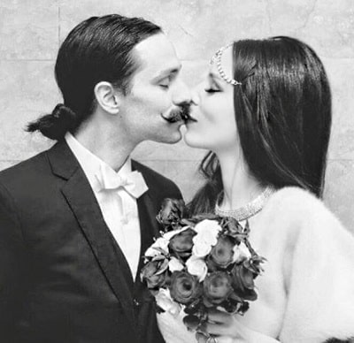 DJ Empress along with her husband Edward Sarno