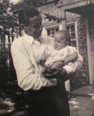 Holland Taylor in the lap of her father C. Tracy Taylor