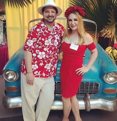 Jenna Karvunidis along with her spouse