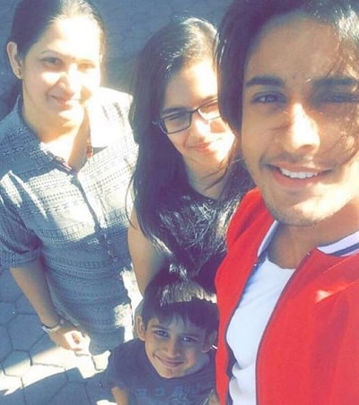 Shagun Pandey pictured along with his mother Vandana Pandey and his cousins
