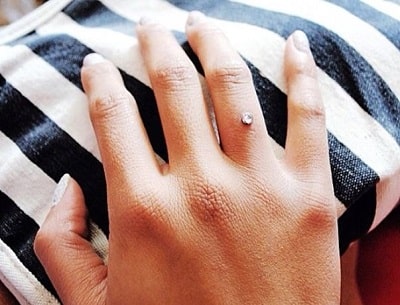 Nava Rose had a finger piercing