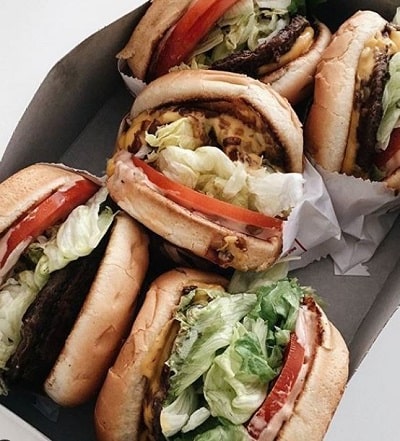 Nava Rose loves burgers which are her cheat meals