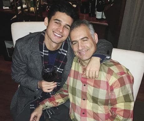 Hunter Sansone with his dad in a photoshoot
