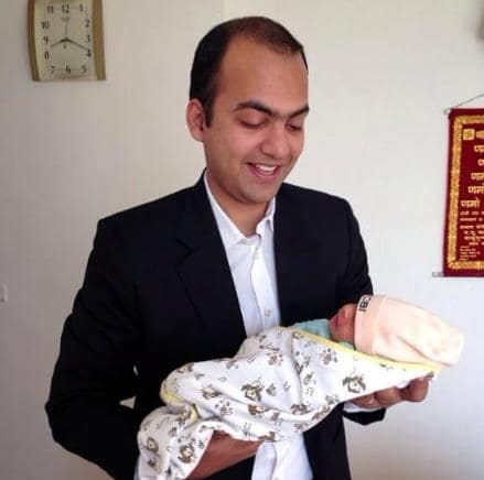 Manu Kumar Jain posing as a father of a son Jordan Jain