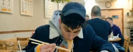 Trevor Tordjman eating noodles at night