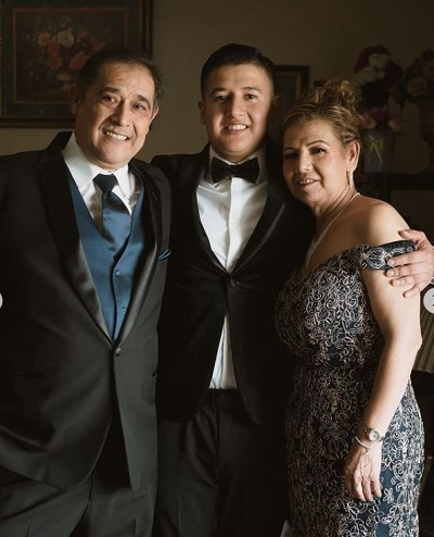 Raul Aguilar with his mom and dad