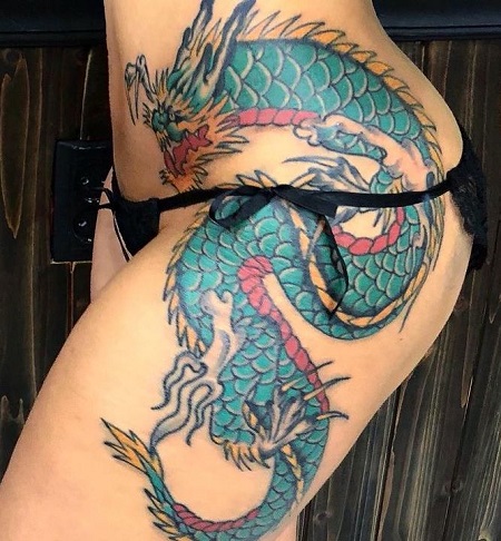 Megan Bowen has a dragon tattoo
