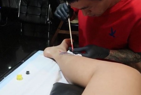 Megan Bowen's ankle tattoo
