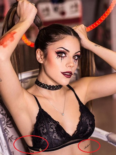 Lucia Bellido has several tattoos on her body