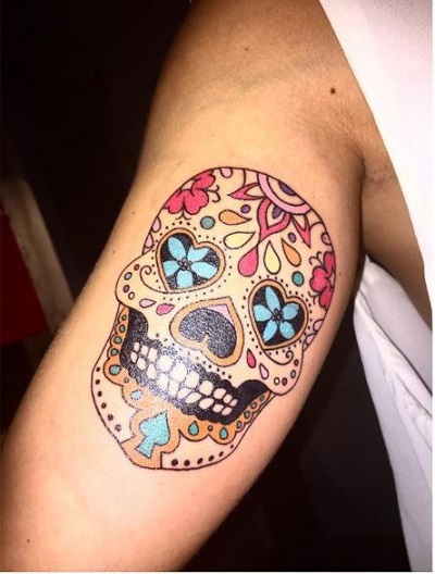 Rocio Flores skull tattoo