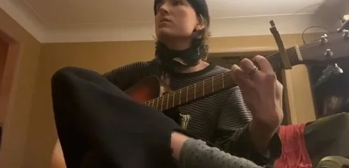 Shelby Flannery enjoys playing guitar