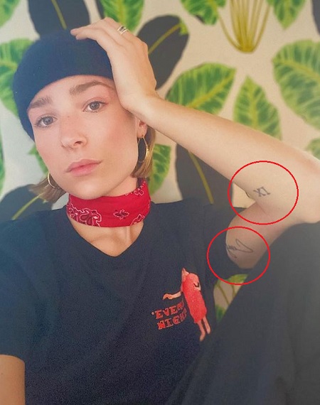 Shelby Flannery has several tattoos on her body