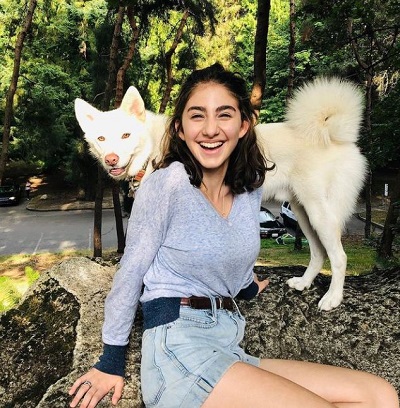Sophia Mitri Schloss with her pet dog Casper