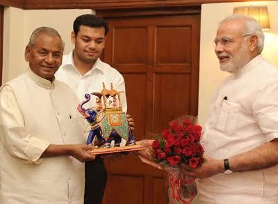 Ramwati Devi's husband Kalyan Singh and grandson Sandeep Kumar Singh with PM Narendra Modi