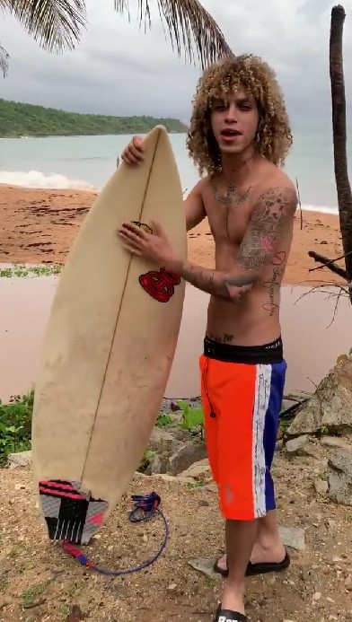 Jon Z likes hoverboarding on beach