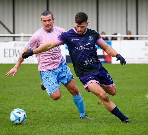 Owen Warner playing football