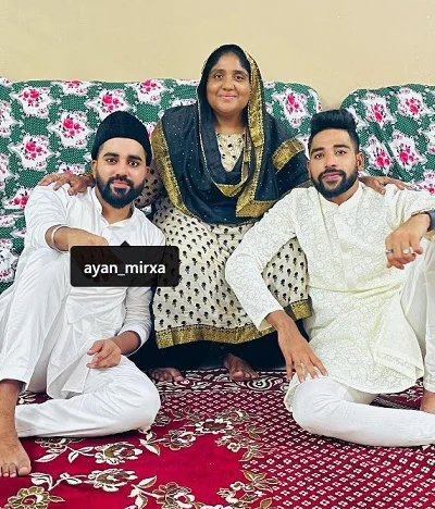Mohammed Siraj with his mother Shabana Begum and brother