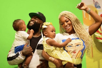 Rick Ross with his girlfriend and kids