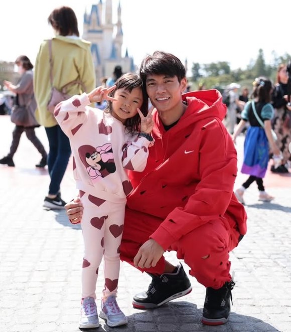 Mickey Allapach with his daughter
