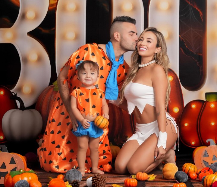 Paula Karpf with her husband and daughter