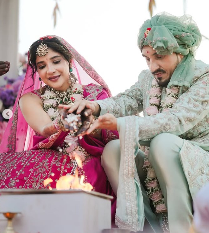 Sakshi Agarwal and her husband's wedding image