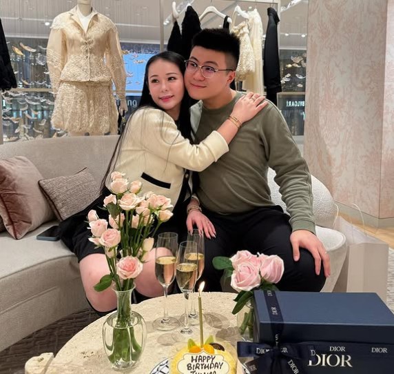 Kamchi Chan with her partner