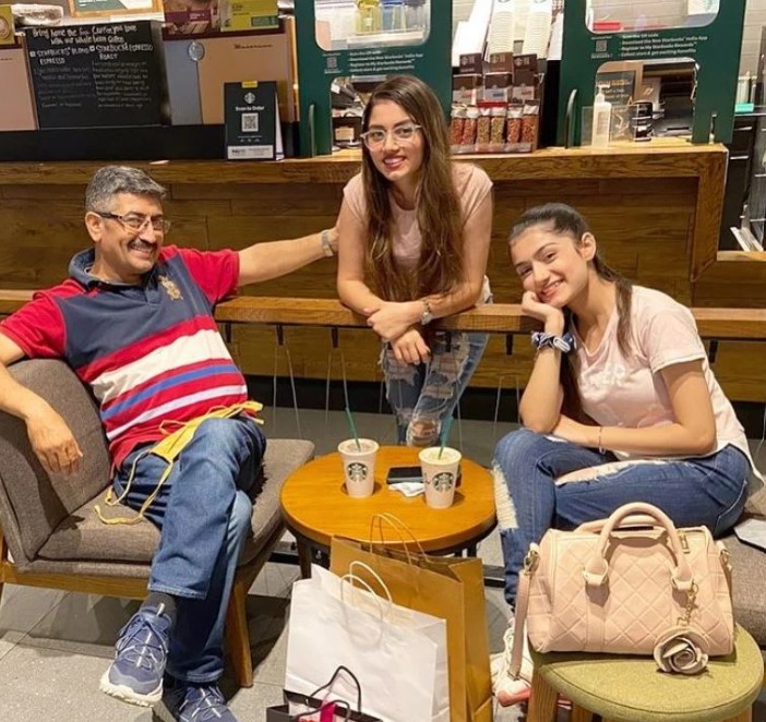 Amulya Rattan with her dad and sister