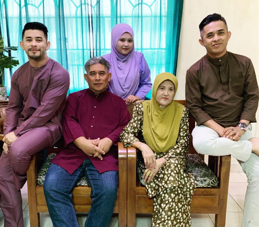One forteen with his family