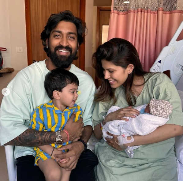 Pankhuri Pandya with her husband and kids