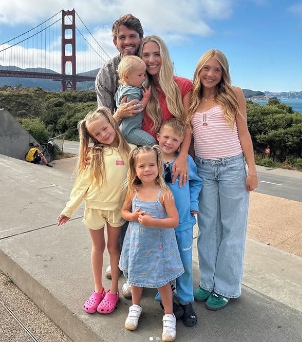 Savannah Soutas with her husband and kids