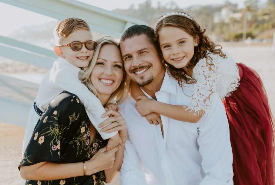 Emily Frlekin with her husband and kids