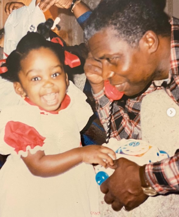 Janelle Burrell's childhood image with her grandfather