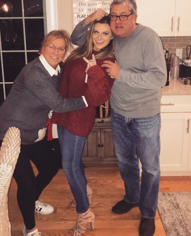 Sara Civian with her parents