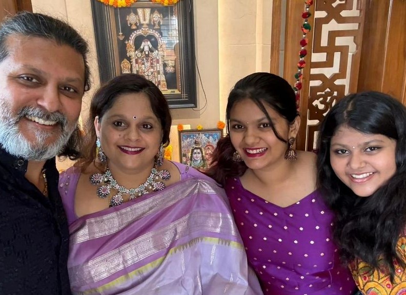 Dileep Raj with his wife and daughters