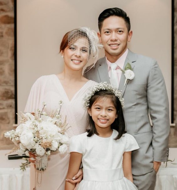 Nikki Valdez with her husband and daughter