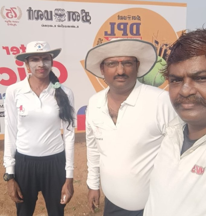 Rithika Sri posing with her senior officials on a cricket ground