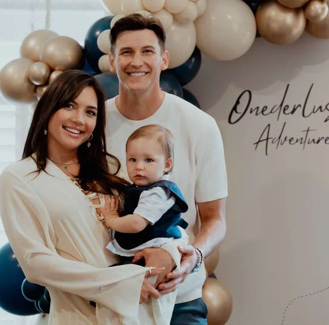 Blake Horstmann with his partner and son