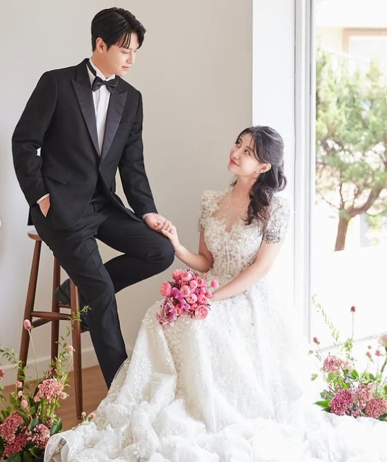 Gi Taek with his wife