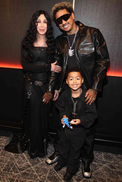 Alexander Edwards with his partner Cher and son