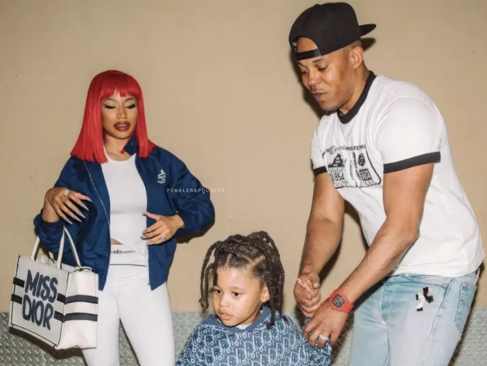 Kenneth Petty with his wife and kid