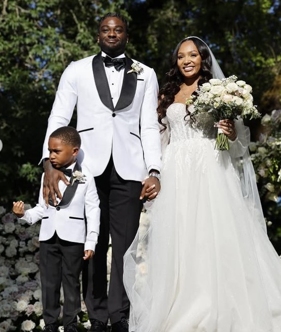 Rochelle Searight with her husband and son