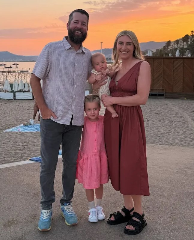 Brett Roth with his wife and kids