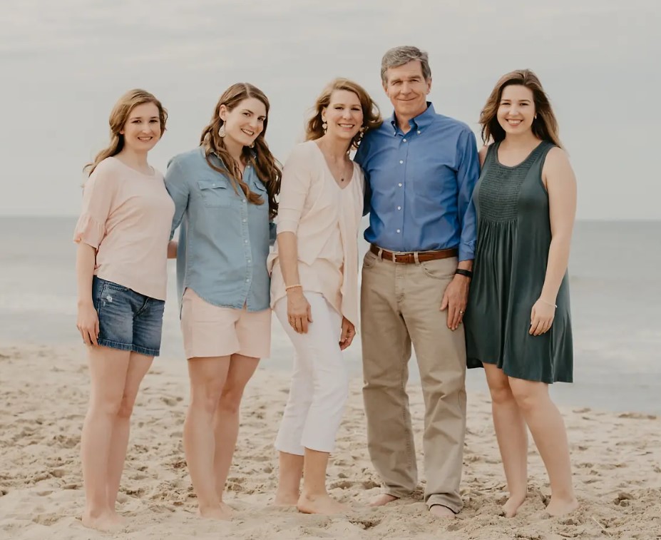 Roy Cooper with his wife and daughters