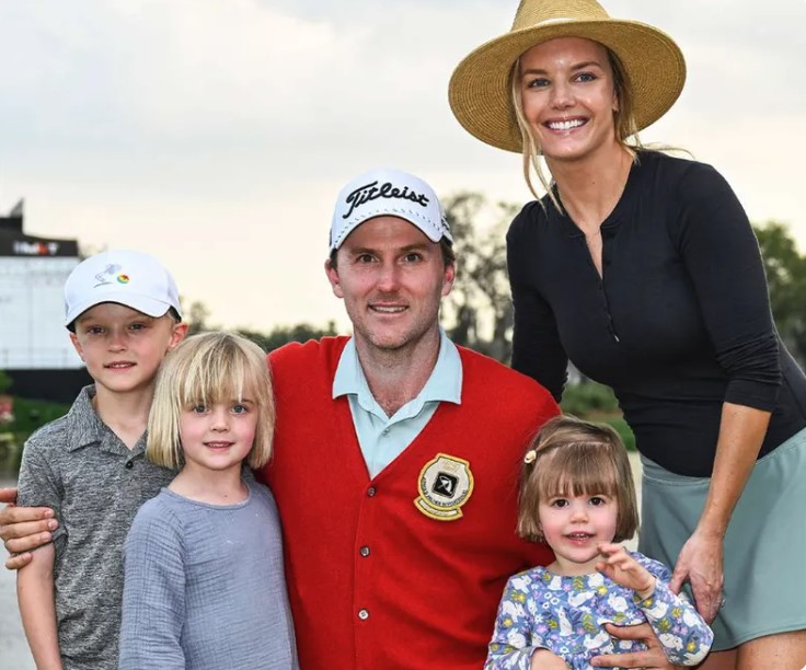 Russell Henley with his wife and kids