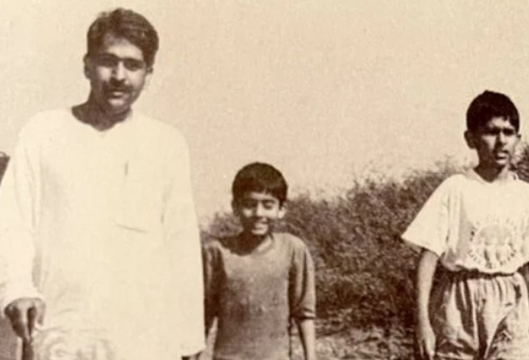 Sanket Upadhyay (right) with his father and sister (middle)